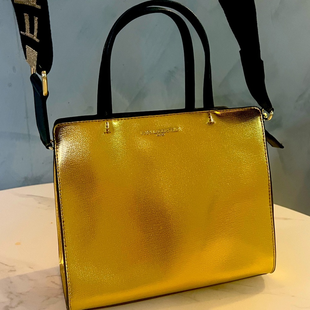 Karl Lagerfeld gold metallic handbag with black handlles & shoulder strap